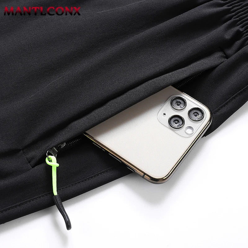 Pantalones cortos deportivos MANTLCONX de secado rápido para hombre