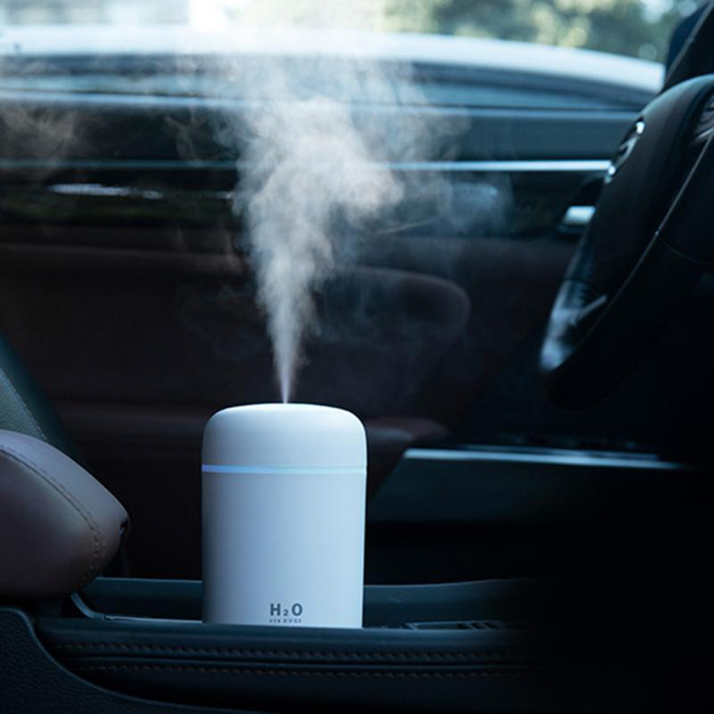 Humidificador de aire portátil con difusor de aceites esenciales para coche o casa.