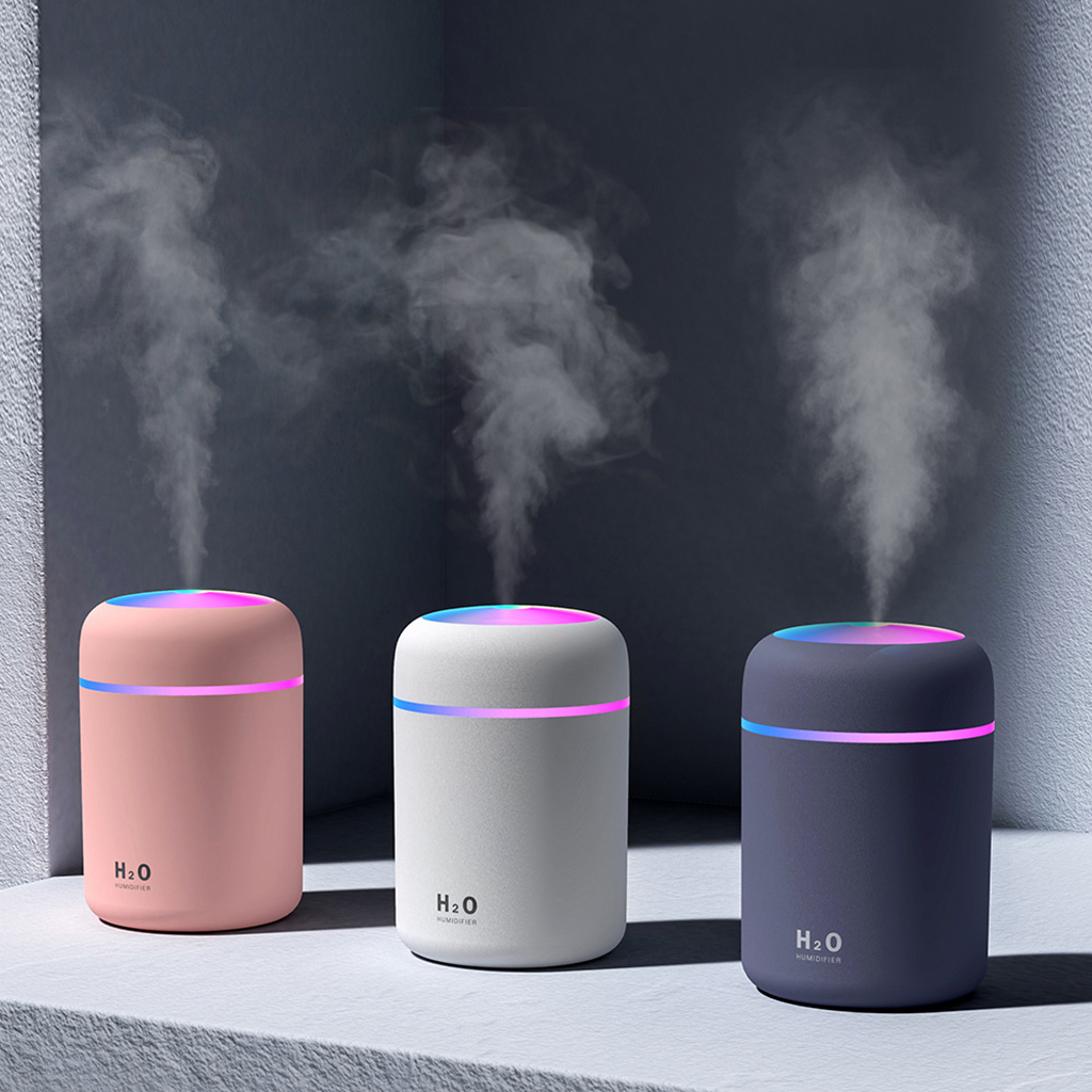 Humidificador de aire portátil con difusor de aceites esenciales para coche o casa.