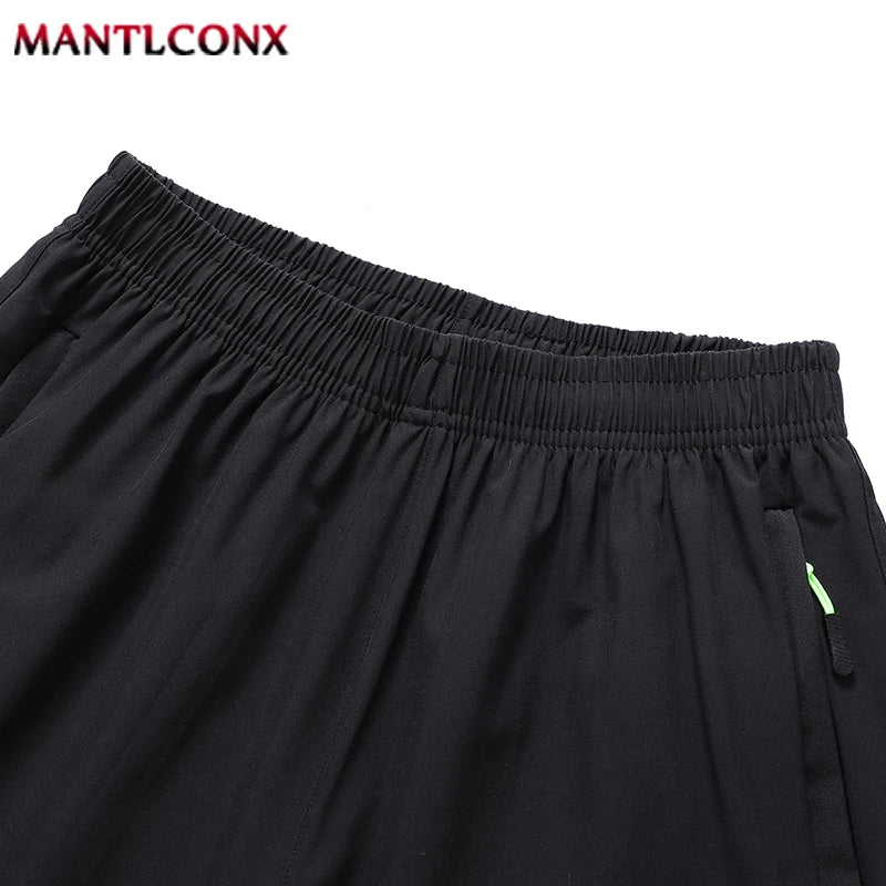 Pantalones cortos deportivos MANTLCONX de secado rápido para hombre 