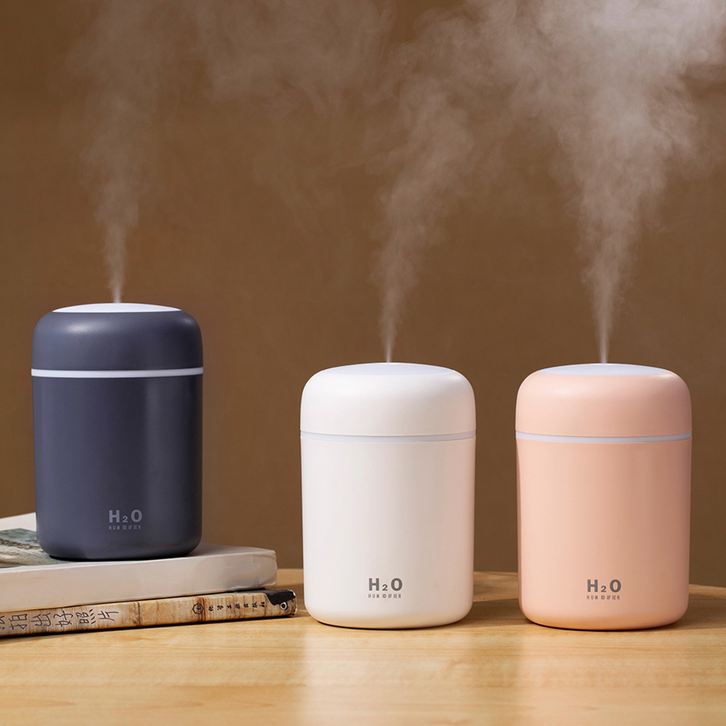 Humidificador de aire portátil con difusor de aceites esenciales para coche o casa.